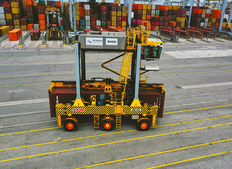 An electric straddle carrier at London Gateway